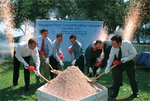The Singapore Flyer Groundbreaking ceremony - from left to right, Mr Thomas Bone- Winkel, Director, Delbrueck Bethmann Maffei (DBM); Mr Chng Hee Kok, Chief Executive Officer, NTUC Club; Mr Lim Neo Chian, Chief Executive and Deputy Chairman, Singapore Tourism Board; Mr Mah Bow Tan, Guest of Honour, Minister for National Development; Mr Peter Purcell, Managing Director, Singapore Flyer Pte Ltd; Mr Ronald Seilheimer, Member of the Divisional Board, Corporates and Markets, HVB Group; and Mr Ken Kobayashi, Senior Vice-President, Division COO Plant Project Division, Mitsubishi Corporation.